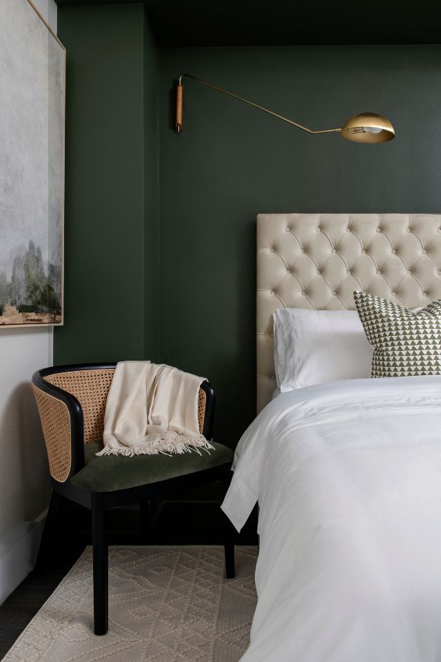 bedroom with green accent wall Design by HIBOU DESIGN + CO Photography by MIKE CHAJECKI
